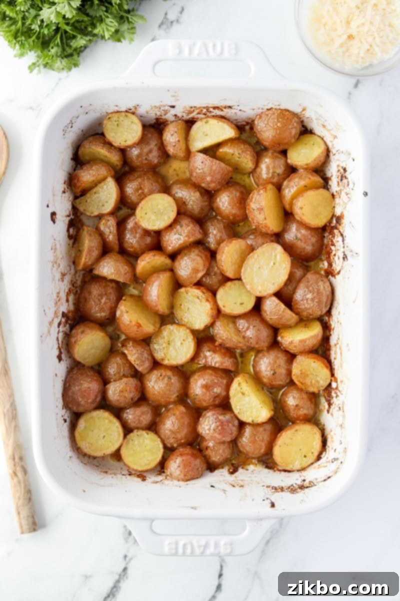 A baking dish with roasted baby potatoes.
