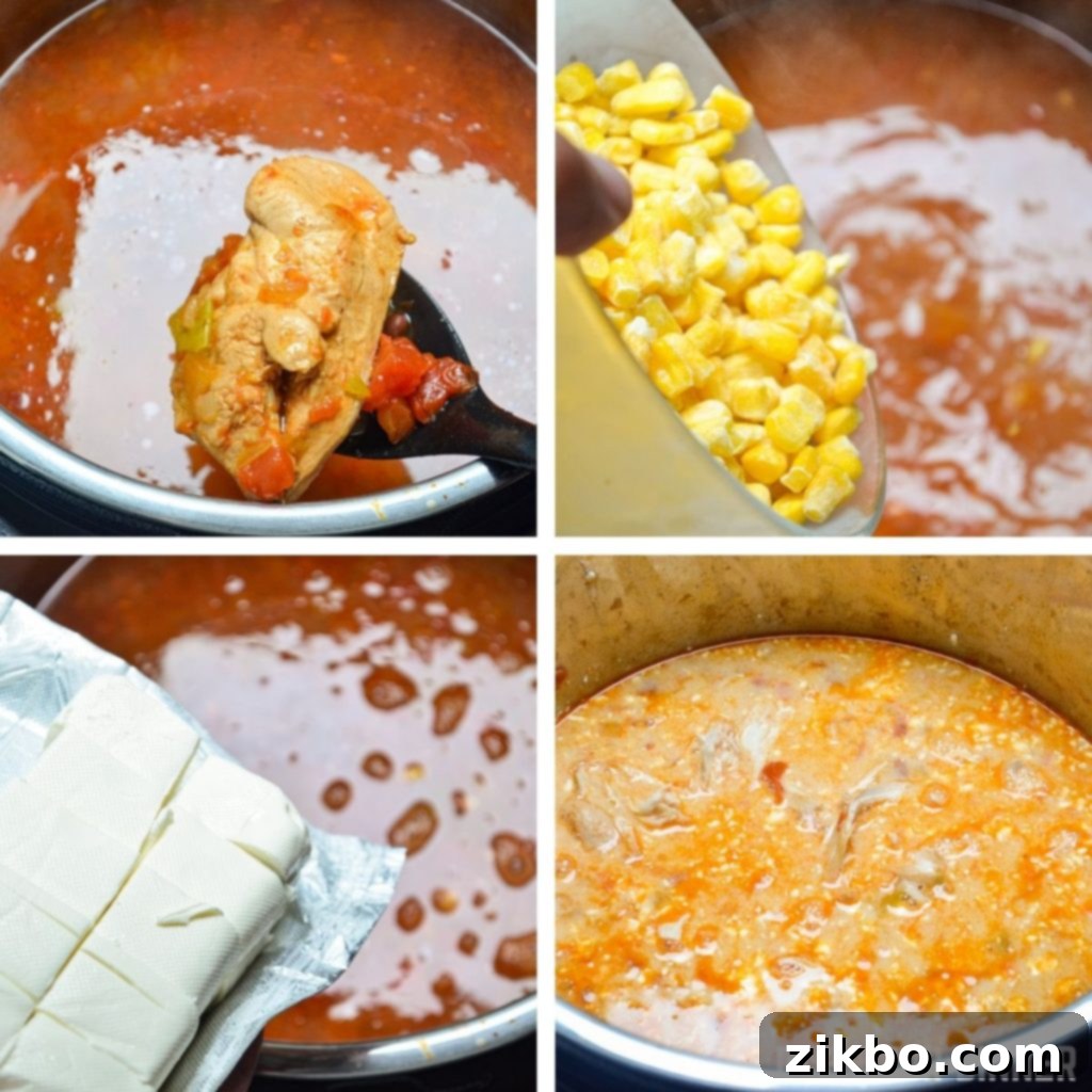 Removing the chicken from a cooked Instant Pot soup, then adding in corn and cream cheese to create a creamy texture.