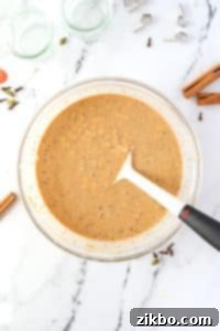 A bowl of overnight oats mixed together and ready to be transferred into jars.