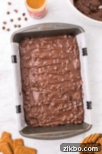 A baking pan filled with brownie batter.