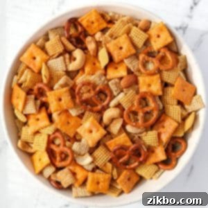 An overhead view of a bowl of Chex Mix.