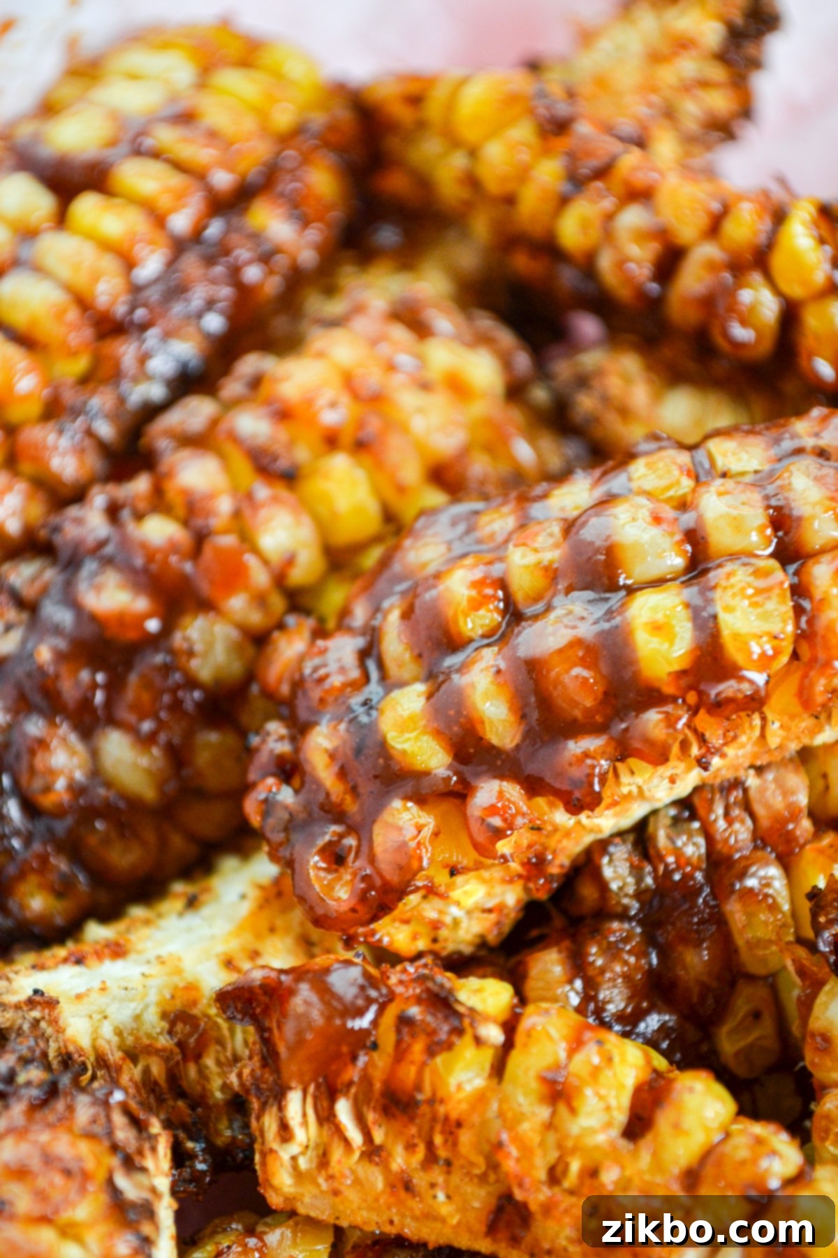 Crispy corn ribs drenched in rich BBQ sauce, a perfect vegan side dish or appetizer.