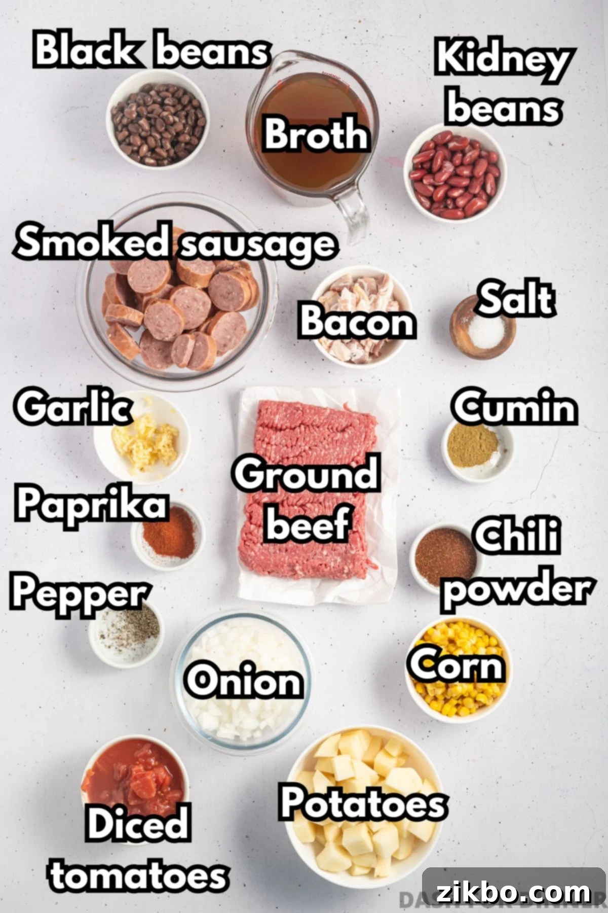 The ingredients needed to make cowboy stew: ground beef, beans, onion, potatoes, broth, etc.