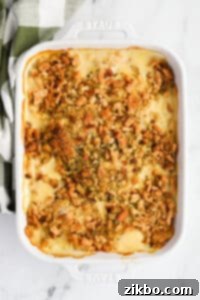 A baking dish filled with chicken and stuffing casserole.