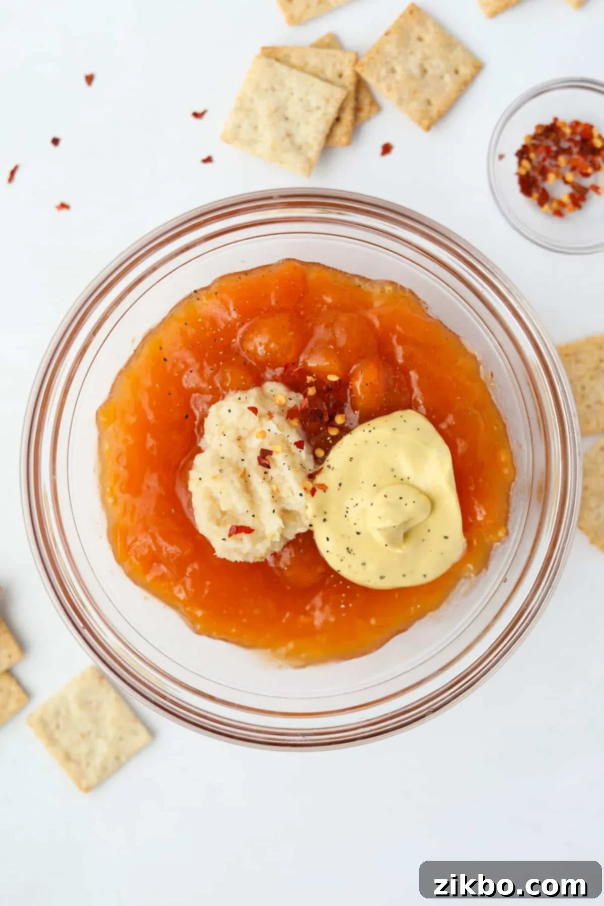 Spicy Southern Jezebel Dip 5 Step 2: Adding Dijon mustard and prepared horseradish to the apricot preserves
